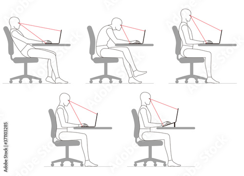 ノートパソコンでデスクワークする人間の姿勢