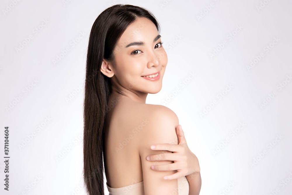 Beautiful Young asian Woman with Clean Fresh Skin, on white background, Face care, Facial treatment, Cosmetology, beauty and spa, Asian women portrait Beautiful Young asian Woman with Clean Fresh Skin, on white background, Face care, Facial treatment, Cosmetology, beauty and spa, Asian women portrait