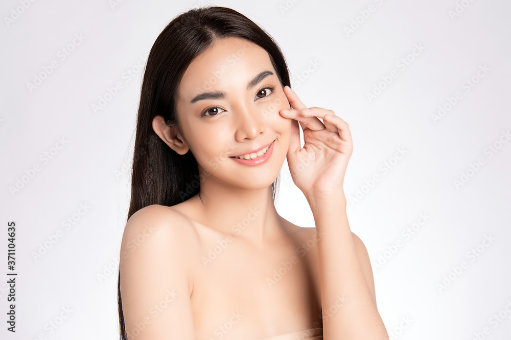 Beautiful Young asian Woman with Clean Fresh Skin, on white background, Face care, Facial treatment, Cosmetology, beauty and spa, Asian women portrait Beautiful Young asian Woman with Clean Fresh Skin, on white background, Face care, Facial treatment, Cosmetology, beauty and spa, Asian women portrait