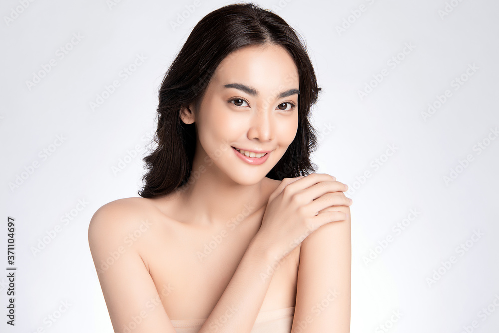Beautiful Young asian Woman with Clean Fresh Skin, on white background, Face care, Facial treatment, Cosmetology, beauty and spa, Asian women portrait Beautiful Young asian Woman with Clean Fresh Skin, on white background, Face care, Facial treatment, Cosmetology, beauty and spa, Asian women portrait