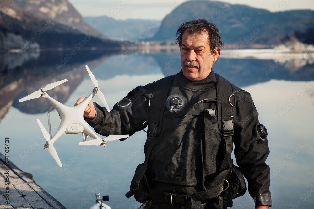 Drone Crash - Diver Holding a Retrieved Drone Drone Crash - Diver Holding a Retrieved Drone