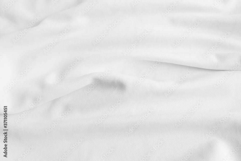 Obraz premium White abstract wavy clothes background. fabric texture