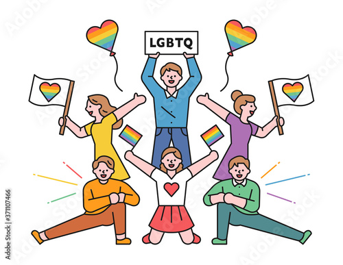 LGBT people are posing together with rainbow flags and pickets. flat design style minimal vector illustration.