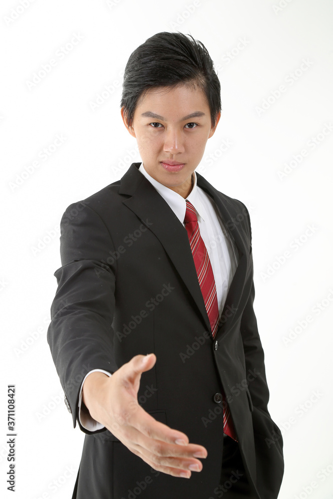 South East Asian young Chinese man wearing formal business office ware on white pose hand forward tor handshake greetings South East Asian young Chinese man wearing formal business office ware on white pose hand forward tor handshake greetings
