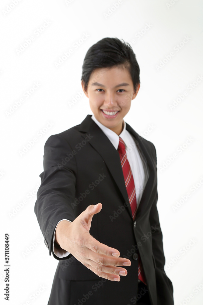 South East Asian young Chinese man wearing formal business office ware on white pose hand forward tor handshake greetings South East Asian young Chinese man wearing formal business office ware on white pose hand forward tor handshake greetings