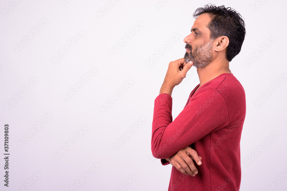 Portrait of mature handsome bearded Indian man Portrait of mature handsome bearded Indian man