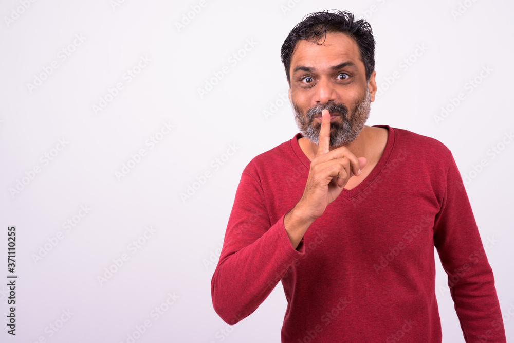 Portrait of mature handsome bearded Indian man Portrait of mature handsome bearded Indian man