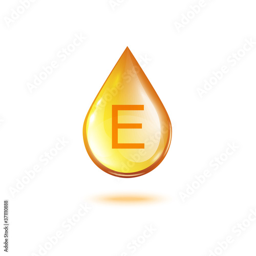 Vitamin E golden oil drop isolated on white background