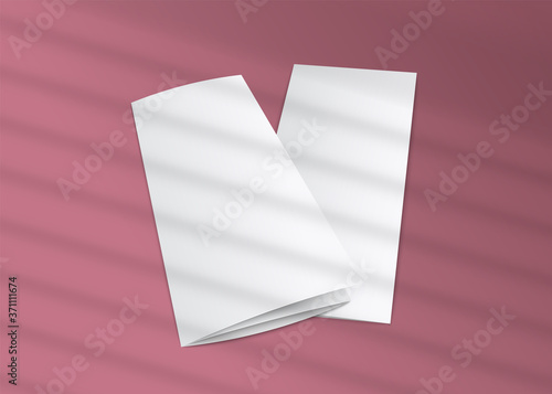 Blank trifold brochure mockup with striped window shades shadow overlay