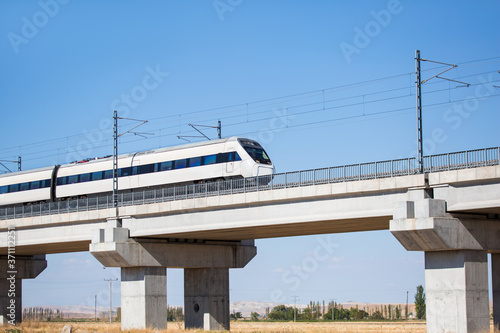 View of a high-speed train crossing a viaduct 