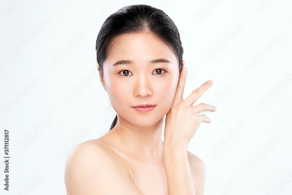 Beautiful Young asian Woman with Clean Fresh Skin, on white background, Face care, Facial treatment, Cosmetology, beauty and spa, Asian women portrait Beautiful Young asian Woman with Clean Fresh Skin, on white background, Face care, Facial treatment, Cosmetology, beauty and spa, Asian women portrait