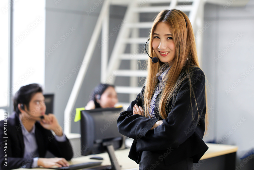 Asia Group of call center workers or Confident business team with headset in office. Asia Group of call center workers or Confident business team with headset in office.
