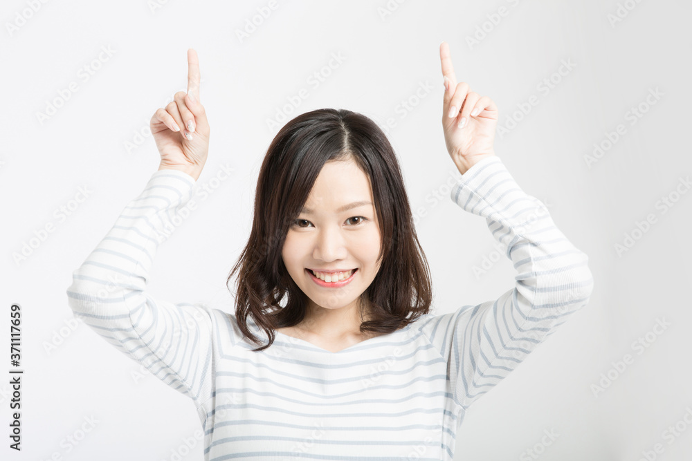 指差しをする女性 指差しをする女性