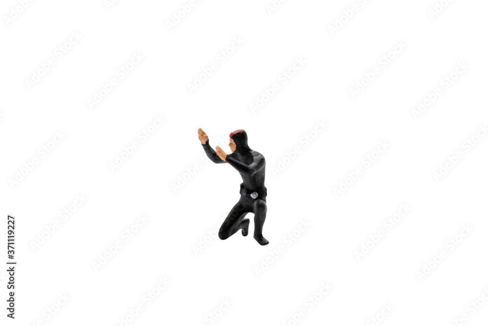 Miniature people : Scuba diver isolated on white background with clipping path Miniature people : Scuba diver isolated on white background with clipping path