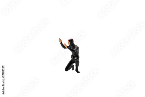Miniature people : Scuba diver isolated on white background with clipping path © Sirichai Puangsuwan
