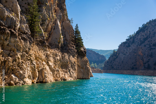 Rocky island with Green canyon in a mountain lake - Oymapınar Dam and Hydroelectric Power Plant, Manavgat / Antalya