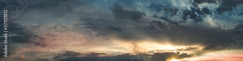 Panorama of the sky with multicolored clouds.