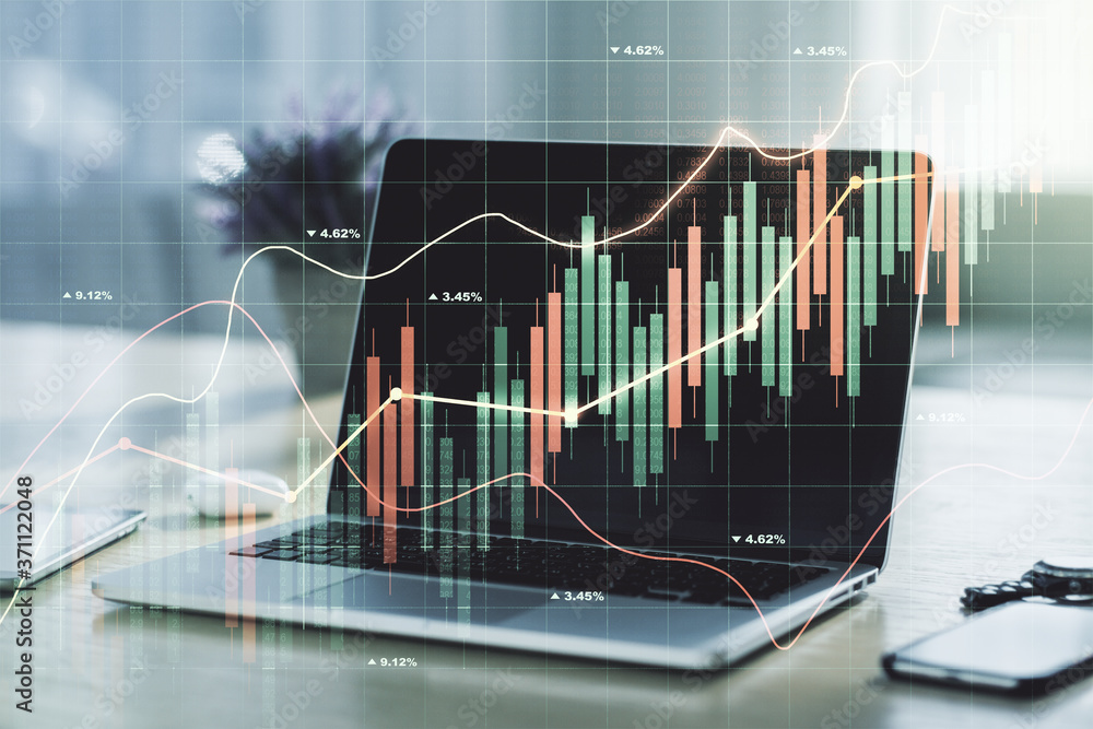 Double exposure of abstract creative financial diagram on modern laptop background, banking and accounting concept Double exposure of abstract creative financial diagram on modern laptop background, banking and accounting concept