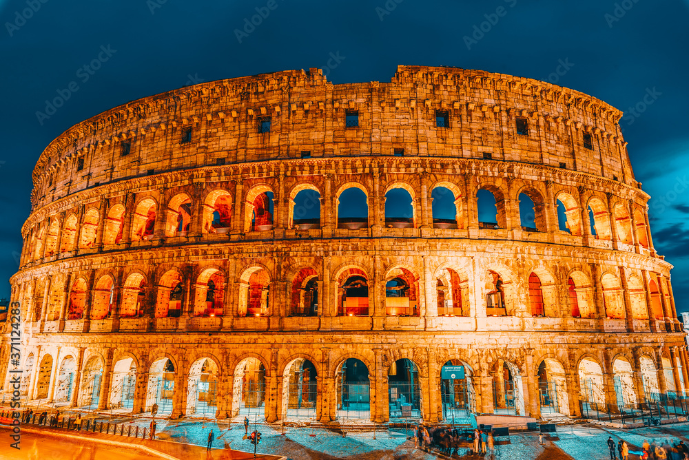 Beautiful landscape of the Colosseum in Rome- one of wonders of the world  in the evening time. Italy.