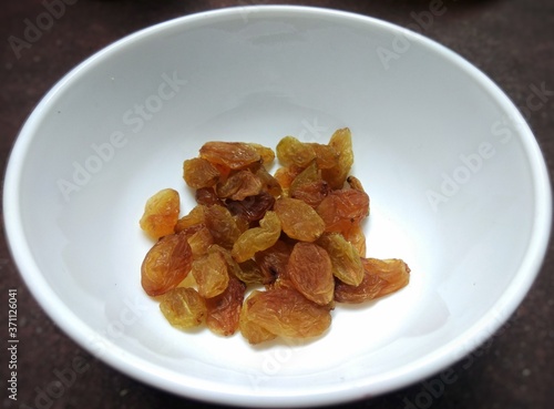 A raisin is a dried Grape. Raisins may be eaten raw or used in Cooking, Baking, and Brewing. The word Raisin is reserved for the dark colored dried large grape