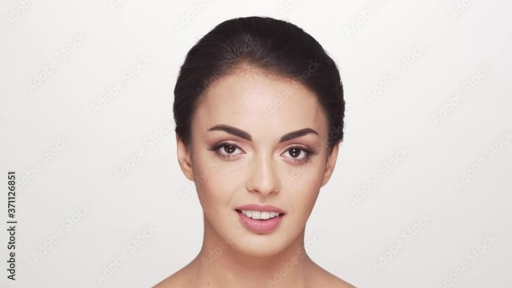 Studio portrait of young and beautiful brunette woman Studio portrait of young and beautiful brunette woman