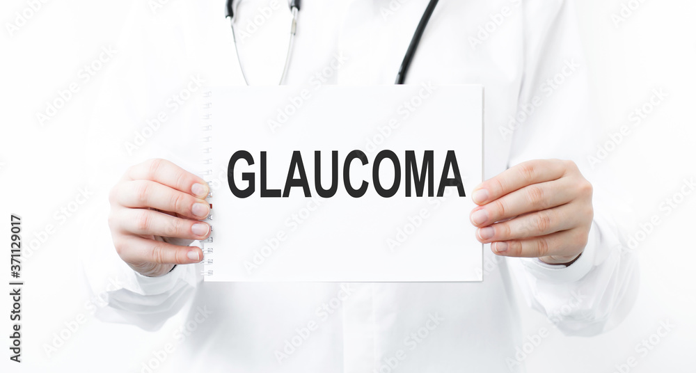 Doctor holding a card with text Glaucoma medical concept Doctor holding a card with text Glaucoma medical concept