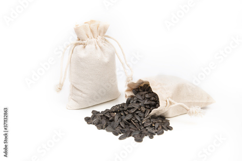 Bag of sunflower seeds on a white background