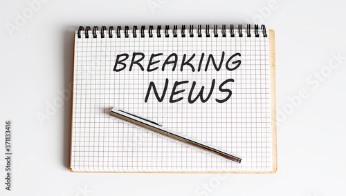 Wallpaper Mural Writing note showing Breaking News. Text white notepad and pen Torontodigital.ca