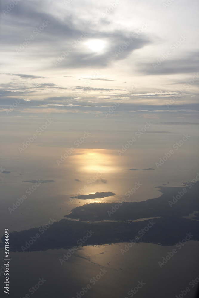 View of earth during sunset from airplane