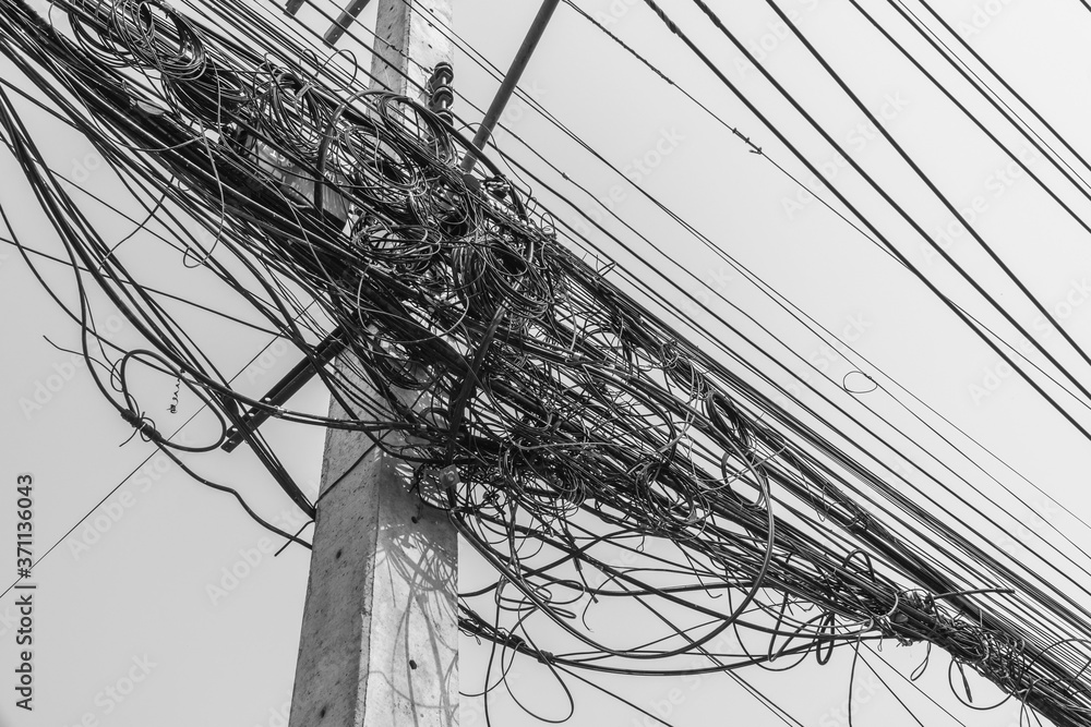 Busy high voltage cables With the cable on the electric pole on the sky