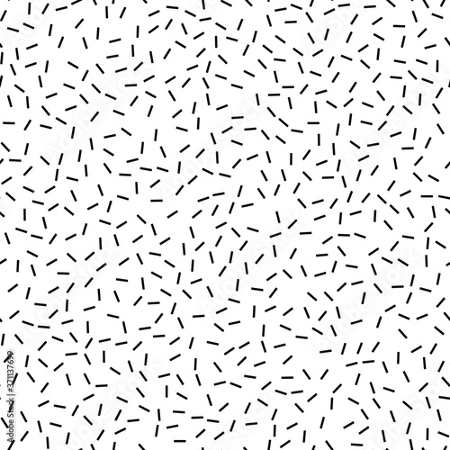 Seamless vector background with random black elements. Abstract black and white ornament. Dotted abstract pattern
