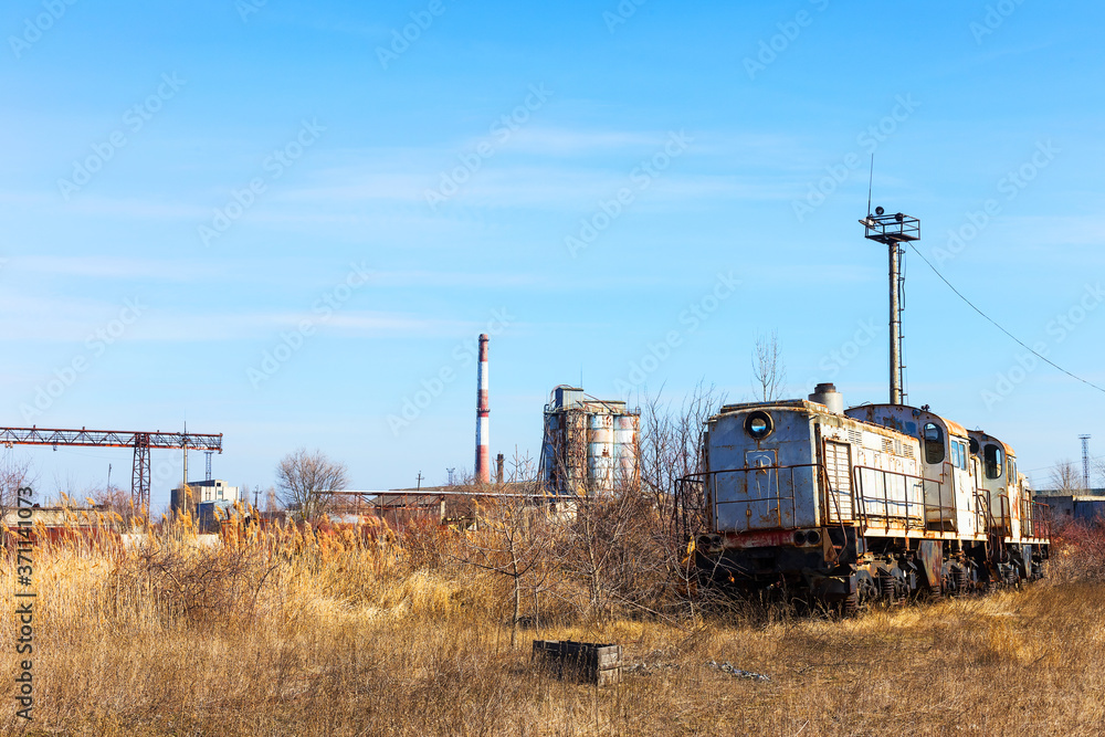 Old rusty steam locomotive. The crisis in Ukraine, the fall of the economy, stop production capacity. Global catastrophe. Old rusty steam locomotive. The crisis in Ukraine, the fall of the economy, stop production capacity. Global catastrophe.