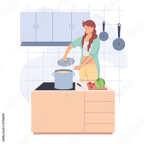 young woman cooking in the kitchen