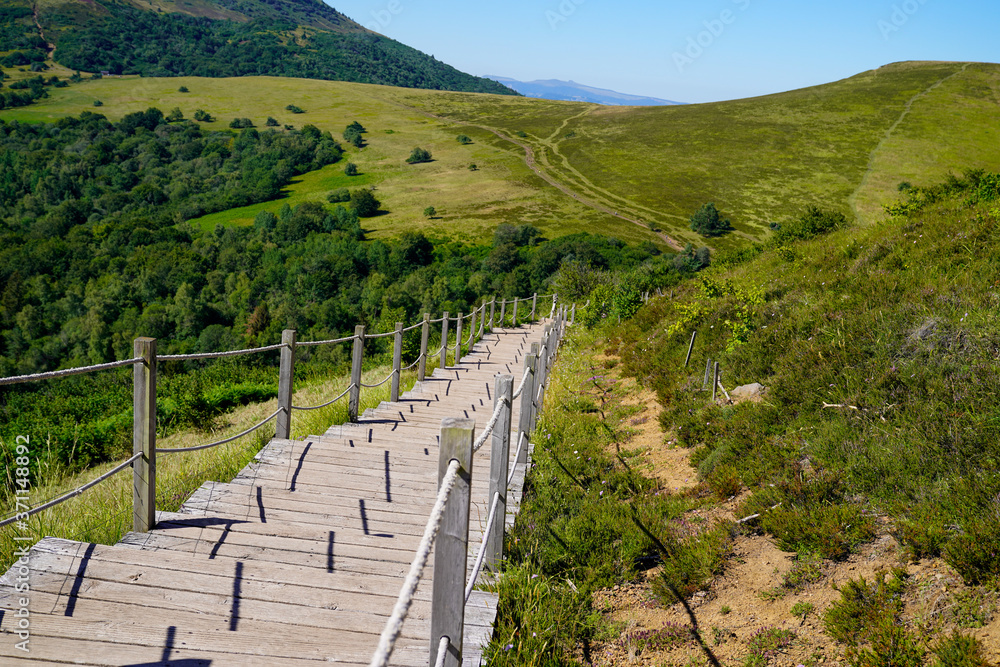 wooden long walking pathway in puy de dome french mountains volcano
