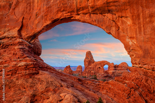 Canvastavla Turret arch through the North Window in Arches National Park in Utah