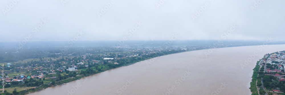 Bird's eye view Panorama view fog covered River in mountain, sky cloud background, Blank for design, in the morning time..