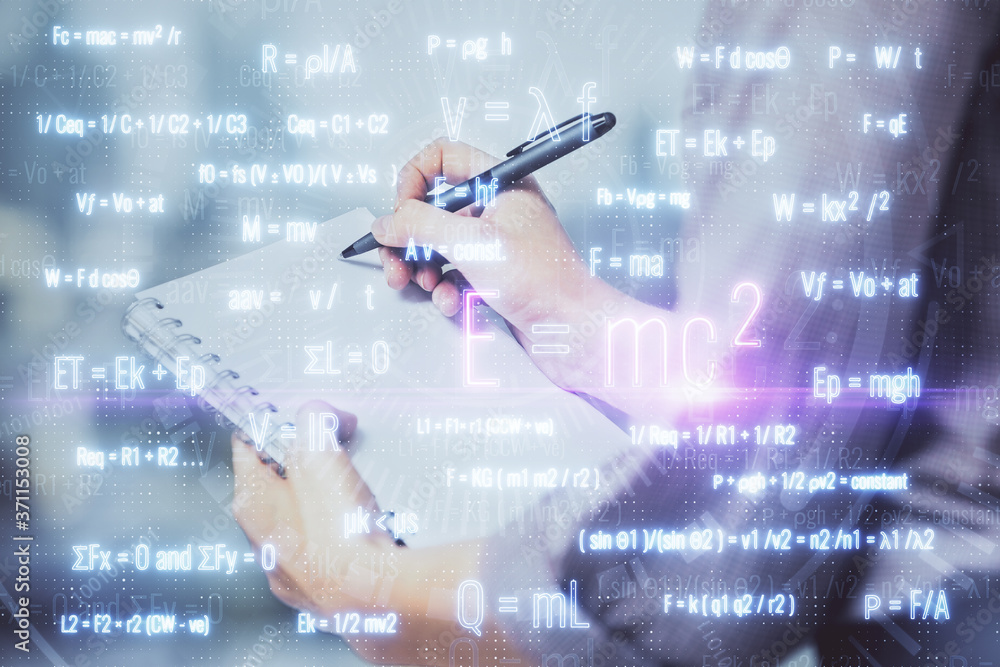 Science formula hologram over woman's hands taking notes background. Concept of study. Multi exposure Science formula hologram over woman's hands taking notes background. Concept of study. Multi exposure