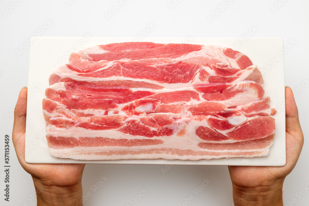 Pork belly on white background Stock Photo | Adobe Stock