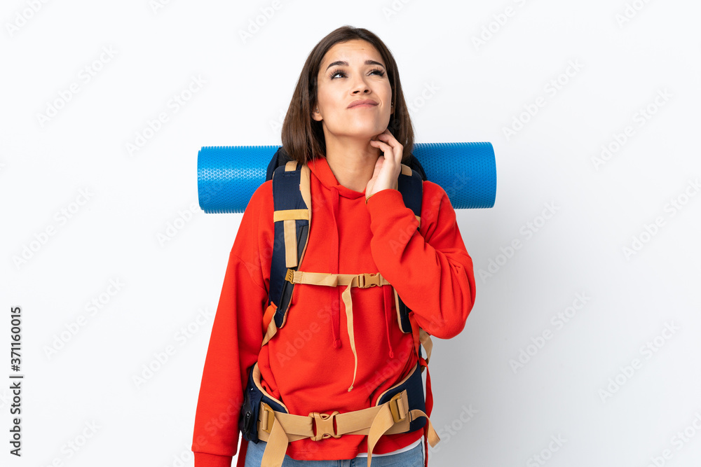 Young caucasian mountaineer girl with a big backpack isolated on white background thinking an idea Young caucasian mountaineer girl with a big backpack isolated on white background thinking an idea