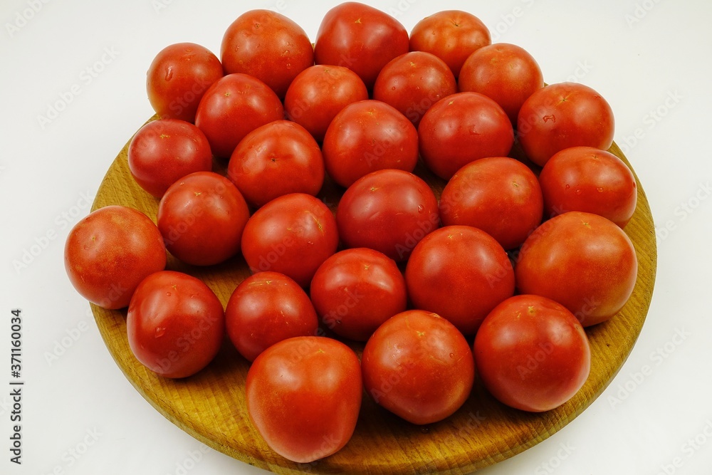 Fresh, ripe red tomatoes, background Fresh, ripe red tomatoes, background