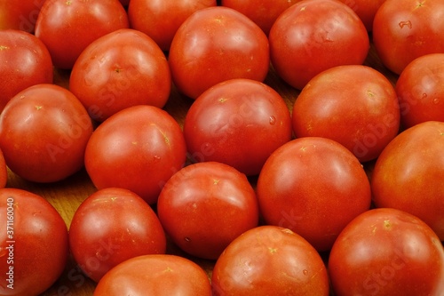 Fresh, ripe red tomatoes, background