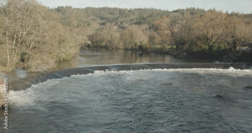 Wallpaper Mural Scene of a river with small waterfall on winter time. Tambre river Pontemaceira, Galicia, Spain Torontodigital.ca