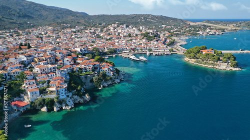Aerial drone panoramic photo of picturesque main town of Skiathos island featuring small landmark peninsula of Bourtzi, Sporades, Greece © aerial-drone