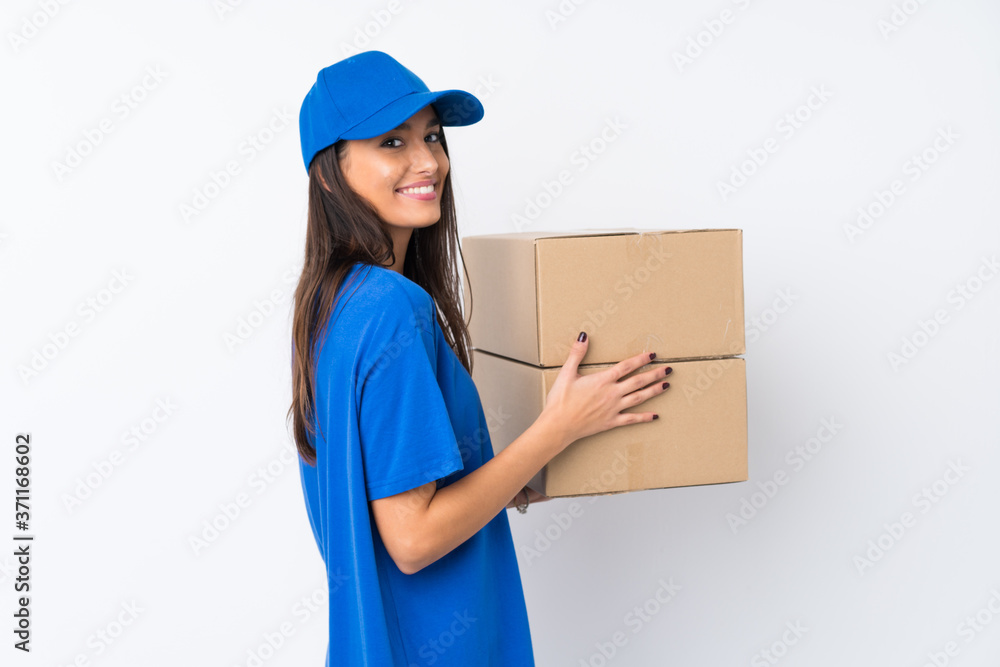 Young delivery woman over isolated white background laughing Young delivery woman over isolated white background laughing
