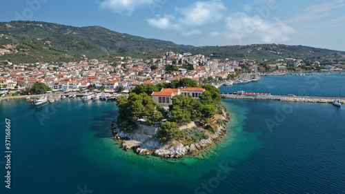 Fototapeta Naklejka Na Ścianę i Meble -  Aerial drone panoramic photo of picturesque main town of Skiathos island featuring small landmark peninsula of Bourtzi, Sporades, Greece