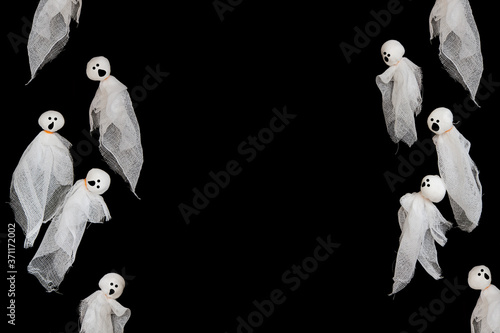 Halloween crafts, ghost on black background with copy space for text. halloween concept. idea for creativity, Top view, flat lay