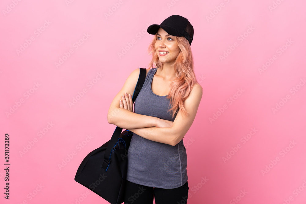 Teenager sport woman with sport bag over isolated background happy and smiling Teenager sport woman with sport bag over isolated background happy and smiling