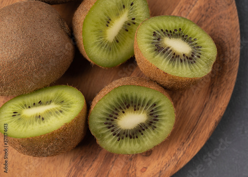 close-up of a kiwi in a cut on a plate