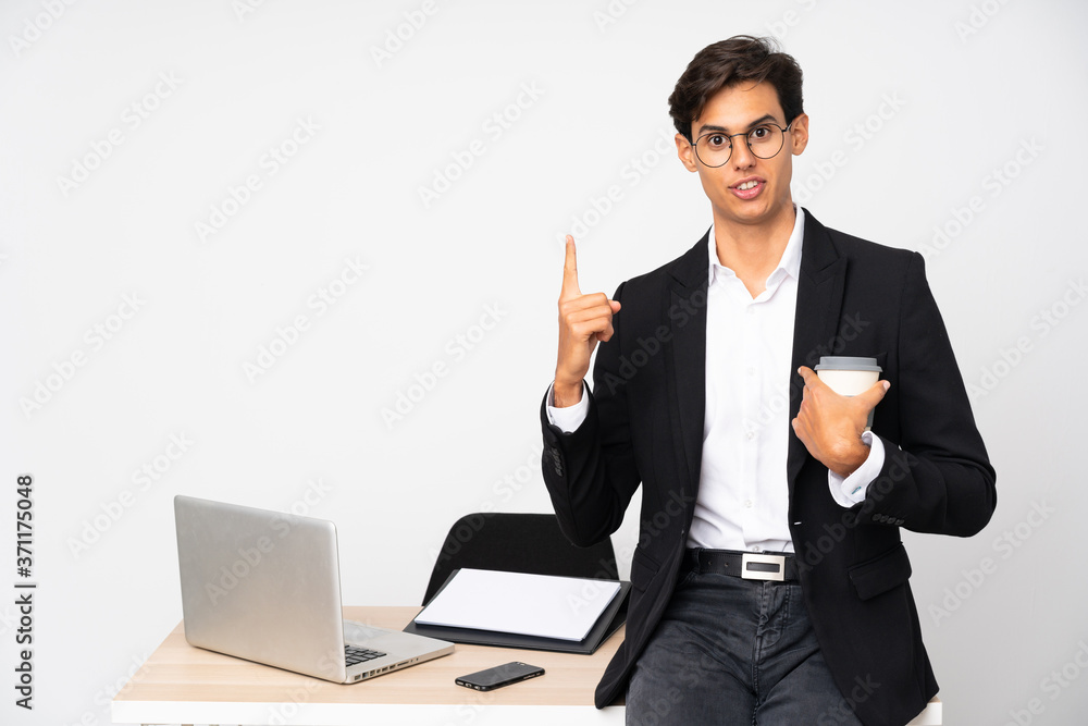 Businessman in his office over isolated white background with surprise facial expression Businessman in his office over isolated white background with surprise facial expression