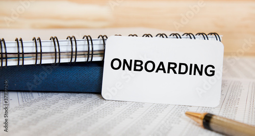 Word writing text Onboarding. Business concept for Action Process of integrating a new employee into an organization Man holding marker notebook page crumpled papers several tries mistakes.